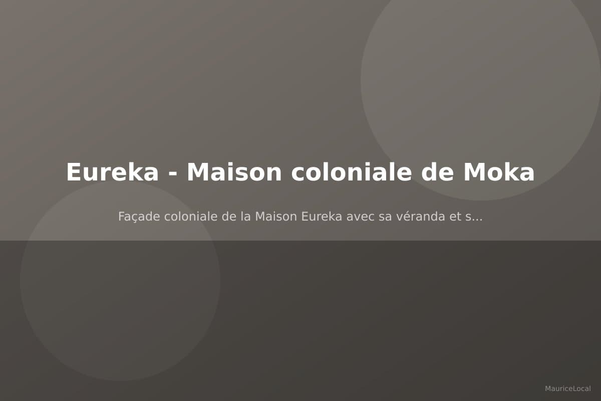 Façade coloniale de la Maison Eureka avec sa véranda et son jardin